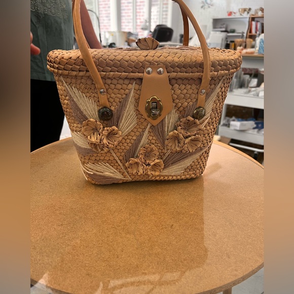 25% off of listed price. Small vintage straw bag. Two handle strap. Lock closure - Picture 2 of 3